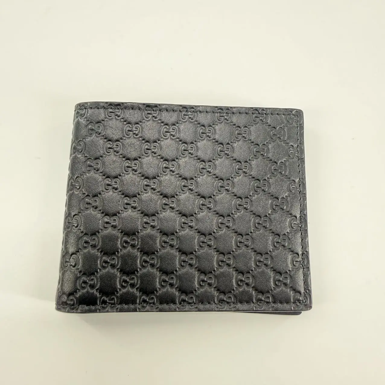 Pre-owned GUCCI Micro Guccissima Bi‑Fold Wallet