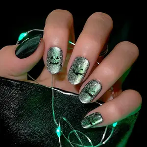 Press On Nails in Neon Green with Pumpkin Smiley Oval Stiletto Fake Nails for Halloween Trend with Salon Quality Easy-to-use Tear-off Tab
