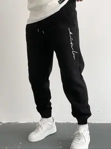 Men's Casual Jogging Pants with Convenient Pockets and Letter Print, Comfortable Drawstring Design for Sports and Leisure, Fitted Stretchy Fabric