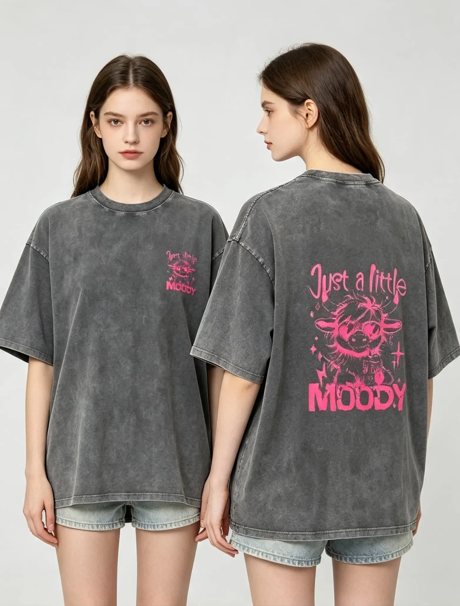 A slightly moody washed oversized T-shirt for men and women, vintage graphic tee with front and back print, black 100% cotton casual short-sleeve crew neck unisex streetwear shirt, retro Y2K-inspired loose-fit top, soft, breathable everyday shirt for coll