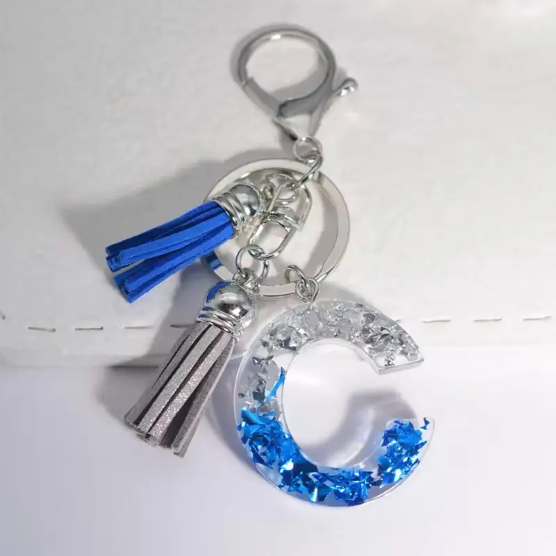 Unisex Stylish Glacier Sea Resin Keychain, 26 Unique A-Z Sequin Filling, Blue Gray Tassel Pendant, Anti-Rust Split Rings, Durable Steel, Sleek Metal Polish, Daily Handbag Fashion Accessory