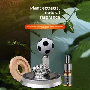 Car-mounted aromatherapy ornament, solar-powered perfume holder, rotating football-shaped diffuser, high-end car interior accessory