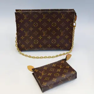 Pre-owned leather toiletry bag Louis Vuitton Toiletry Pouch On Chain – Iconic Monogram Canvas with Gold Tone Hardware