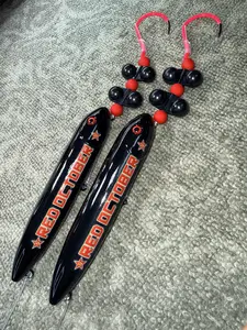 Red October Rig Large (13cm) 2 Pack: Pre-tied subs on 8/0 fluorescent pink hook and 100 pound smoke blue mono leader line