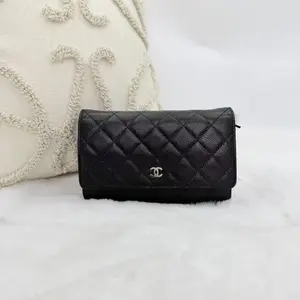 Pre-owned CHANEL caviar leather WOC black