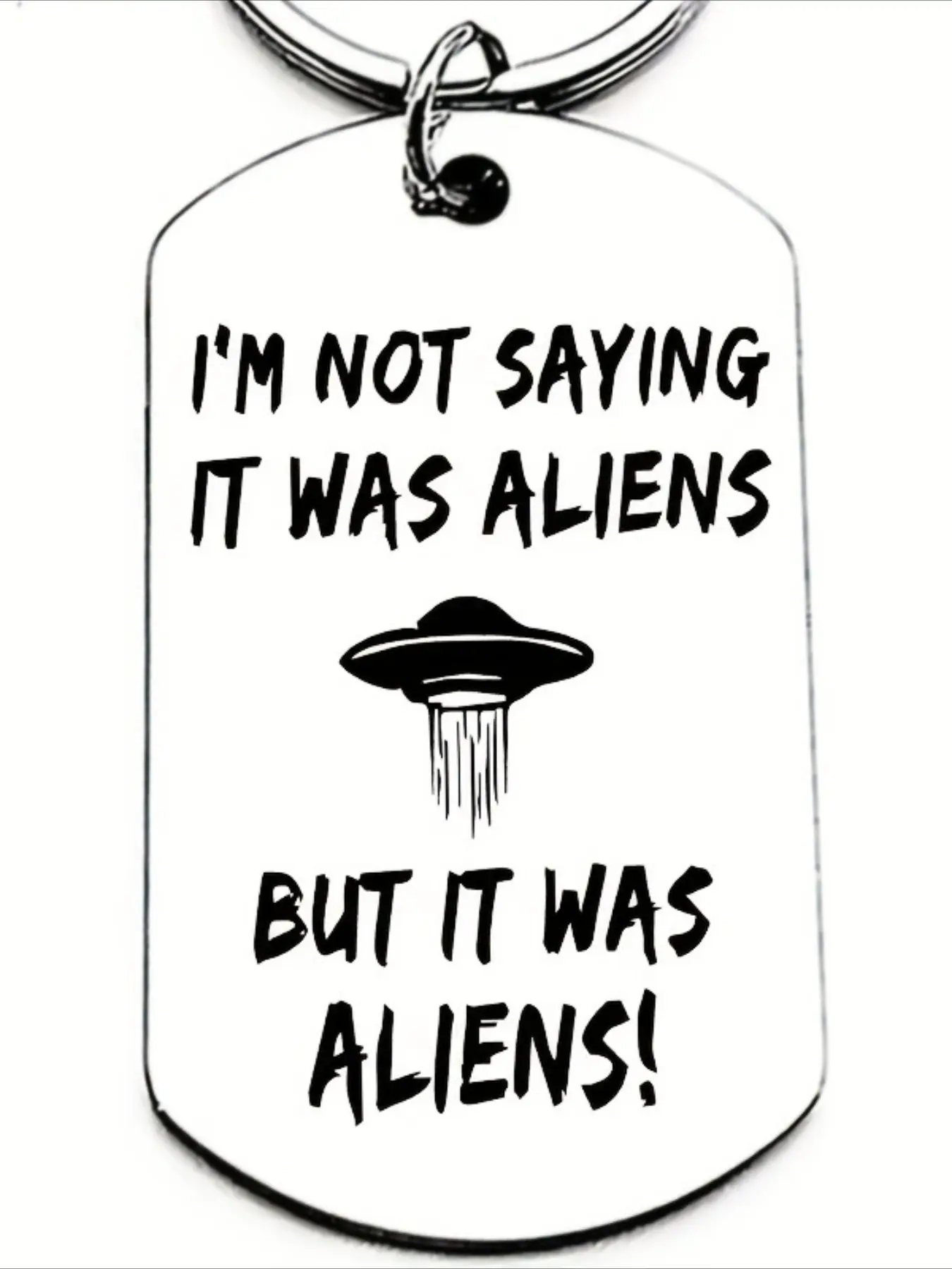 1 fun alien keychain featuring a UFO and the phrase "I didn't say aliens," perfect as a gift for sci-fi fans and UFO enthusiasts, and the ideal present for fans of alien movies, with a humorous alien-themed design