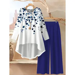 Women’s printed irregular long-sleeve top and elastic-waist wide-leg pants two-piece set, suitable for beach vacations, casual outings, relaxing at home, holidays, and family gatherings; comfortable everyday wear GARMENTARY