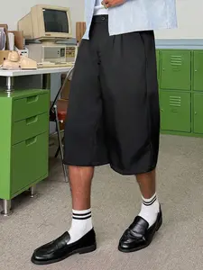 Men’s black pleated wide-leg suit shorts — Business casual, street style, loose fit, clean fit; minimalist relaxed design for commuting and office wear; versatile streetwear; lightweight everyday casual style.