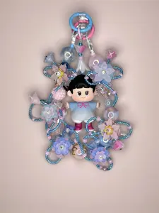 Bag Charm - Adorable Figure Design, Intricate Blue and Pink Flowers, Beaded Accents for Luggage and Bag Accessories