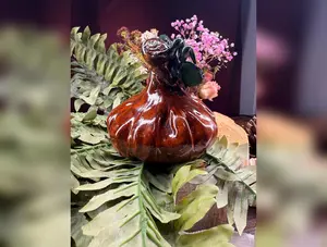 Hand made pinch pot pumpkin w/ snail.