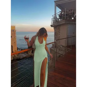 Women’s plain backless sweater with floral decoration; sleeveless beach vacation dress with a thigh slit; spring women’s dress; fitted camisole dress