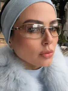 Fashionable frameless oval sunglasses, high-end sunglasses, personalized and practical windproof glasses