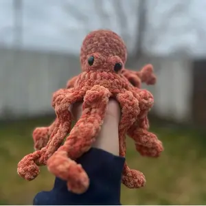 Hand crocheted red/orange drift the octo