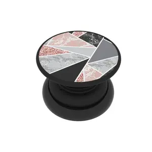 FAB POPS Phone grip, stand and mount with built in magnets allowing for your smartphone to mount to metal and magnetic surfaces