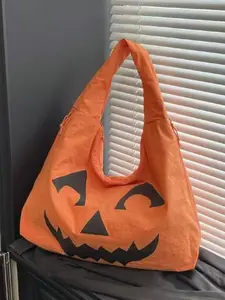 Halloween pumpkin face shoulder bag, daily shopping Halloween funny style handbag shopping bag, simple solid color, fashionable and practical casual versatile, niche design suitable for daily travel, shopping, etc.