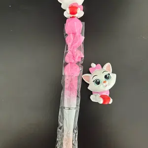 A doorable beaded pen.