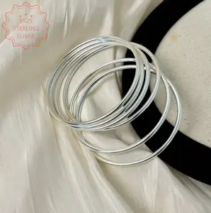 S925 Sterling Silver Women's Stackable Bangle Set – Available in high-polish and matte finishes. Minimalist delicate layered bracelets, hypoallergenic textured silver open bangles. An elegant gift choice for her birthday and anniversary.