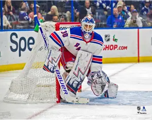 Henrik Lundqvist New York Rangers Unsigned White Jersey in Net Photograph