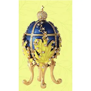 Deep Blue and Yellow Lily of the Valley Collection imperial egg. This opens up as a jewelry box and stands at 4.25" tall, featuring lovely colors.