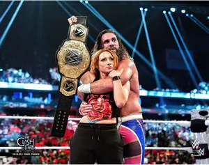 Seth Rollins & Becky Lynch WWE Unsigned 2025 Clash In Paris Raising Title Photograph