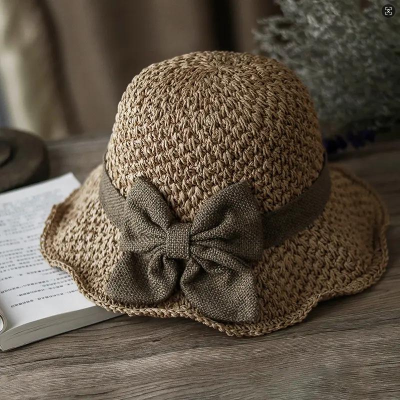 Versatile retro woven handmade straw hat with ruffled bow, elegant French sun hat, foldable, breathable travel beach hat.