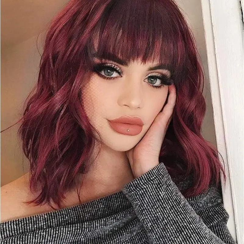 Women's Voluminous Short Curly Bob Wig with Chic Bangs - Female Synthetic Full Machine Wig, 14 in, Heat Resistant, Natural Hair Feel, Adjustable Straps, Breathable Net Cap