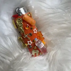 Junk Lighters - Unspecified Product with Decorative Elements and Orange Color Scheme