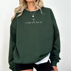 ChicCotton A Bride in a Tini Bit Sweatshirt, Tini Bit Engaged Crewneck, Bridal Shower Long Sleeve Pullover, Fiance Sweater