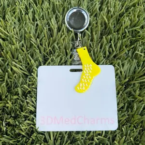 Yellow sock badge keychain