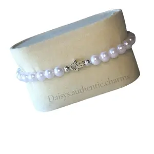 Daisys Authentic Hamsa Hand Charm Evil Eye Bracelet with White Beads and Hamsa Hand Charm by Daisys authentic charms