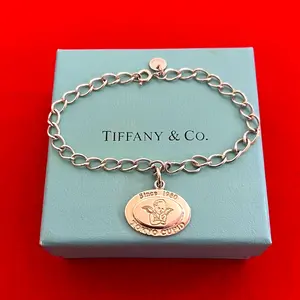 Pre-owned Tiffany & Co. Sterling Silver 925 (Ag925) Small Leather Goods Tiffany&Co. Angel Cupid Silver 925 Bracelet