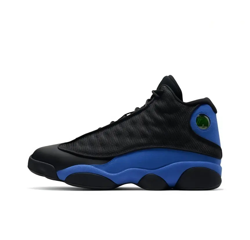 Black woven mid top basketball sneakers decorated with blue color blocks, nice footwear choice for people who enjoy retro basketball inspired street styling in daily life.