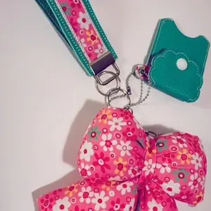 Teal Floral Keychain with Pink Bow & Teal Sanitizer/Airpod Case Stylish Accessory for Elegant & Practical Use