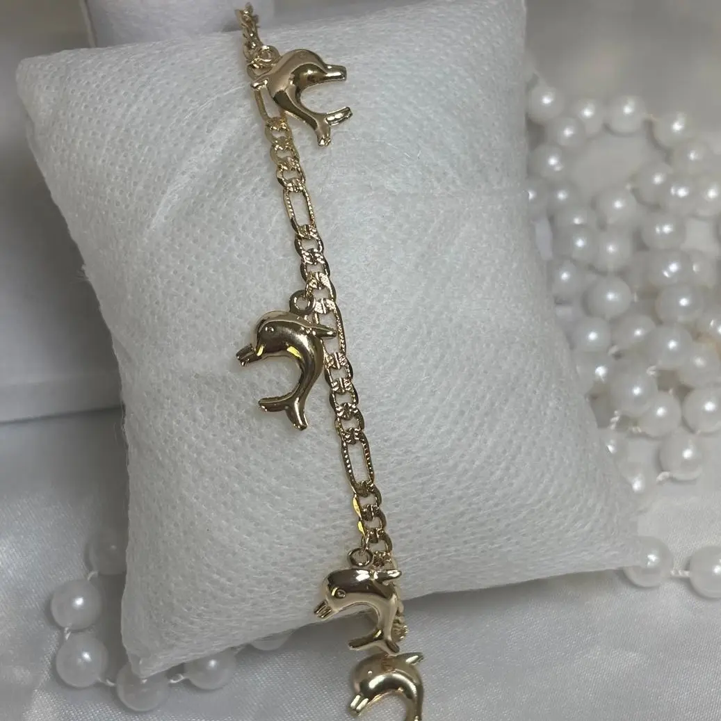 Tobillera Laminada en 14k con dijes de delfines elegantes