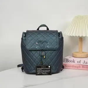 Pre-owned CHANEL Quilted CC Filigree Backpack Caviar Iridescent Dark Turquoise Rainbow Hardware