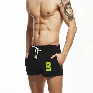 2026 new comfortable and breathable casual sports shorts men's cotton home sleeping shorts three part loose training and running super shorts