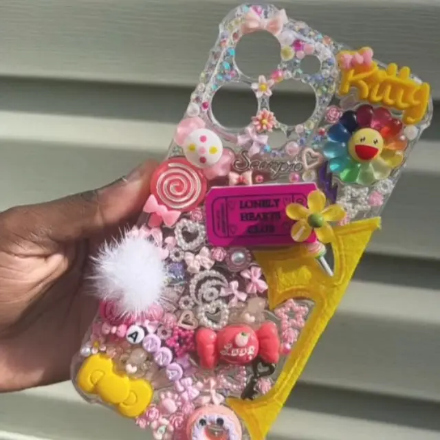 iPhone Junk Case - Colorful Design with Various Decorative Elements and "Kitty" Text, Featuring Butterfly and Heart Shapes