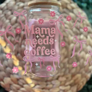 Mama Needs Coffee UVDTF Cup Wrap with Pink Bow Design and Floral Accents for Coffee Lovers