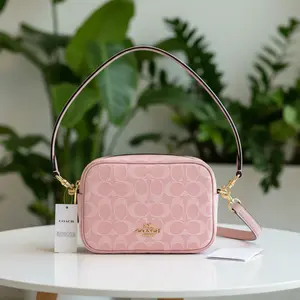 Pre-owned coach Denim Crossbody Bags Pink Mini Carey New