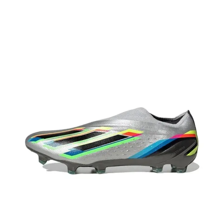 Brand-New Unisex Laceless Firm-Ground Soccer Cleats - Metallic Silver Textured Upper, Vibrant Rainbow Stripe Details, Dark-Toned Stud Outsole, Breathable Perforated Surface, Original Shoe Box for Local Tournaments, Grass-Pitch Drills