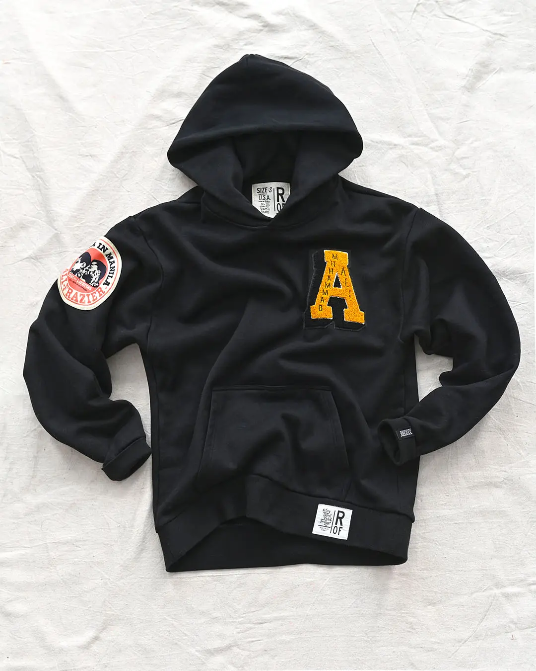 Men's Ali Thrilla in Manila Heavyweight Oversized Polyester-Cotton Blend Knit Pullover Hoodie - Varsity-Style, Chenille Badge, Kangaroo Pocket, Satin Hem