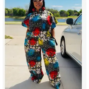 Vibrant ŌMŌGĚ 2 Piece Palazzo Ankara Fit for Women's Fashionable Womenswear Pants that comes with colorful matching handmade rattan earrings.