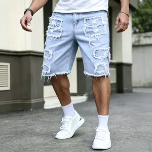 Men’s distressed frayed denim shorts, American vintage distressed patchwork street-style shorts.