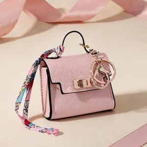 1PCS Mini backpack, keychain, coin purse, mini-bag pendant, PU-leather makeup pouch, change purse, lipstick case, earphone bag, cable organizer.