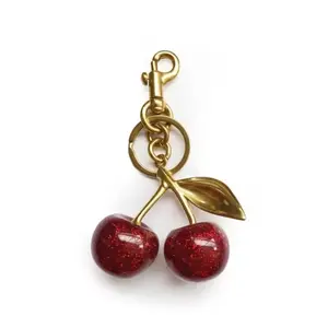 Cherry Bag Charm - Red Sparkling Resin Keychain with Cherry Charm and Gold-Plated Accessory for Coach Purses and Bags