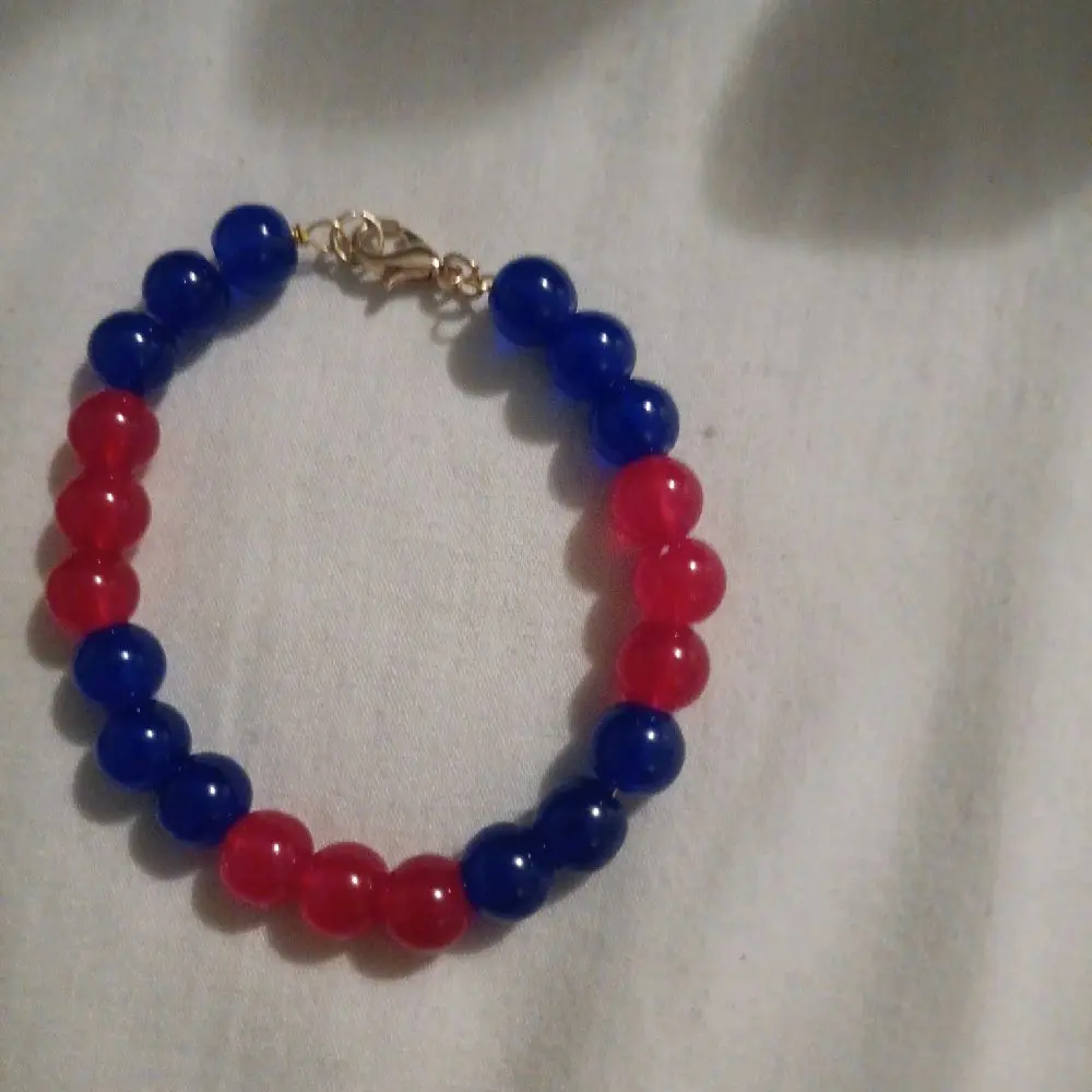 Spiderman themed glass bead wire bracelet