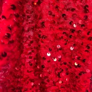 Velvet sequence fabric red great for Christmas dresses and decorations