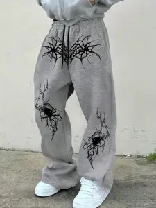 Edgy Spider Web Graphic Wide-Leg Pants — Casual Street Trousers, Hot-Selling Streetwear! Bold White Web & Skull Prints, Drawstring Waist & Oversized Silhouette For Urban Gothic Style. Trendy Statement Bottoms.