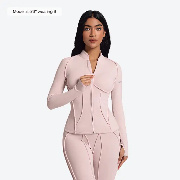 BetterMe Contour Zip-Up Long Sleeve Compression Top in Ballet Pink | Athletic Sports Clothing, Compression Sports Tee & Activewear – Snatched Thumbhole Athleisure Street Fit for Women, Sporty Chic, Female