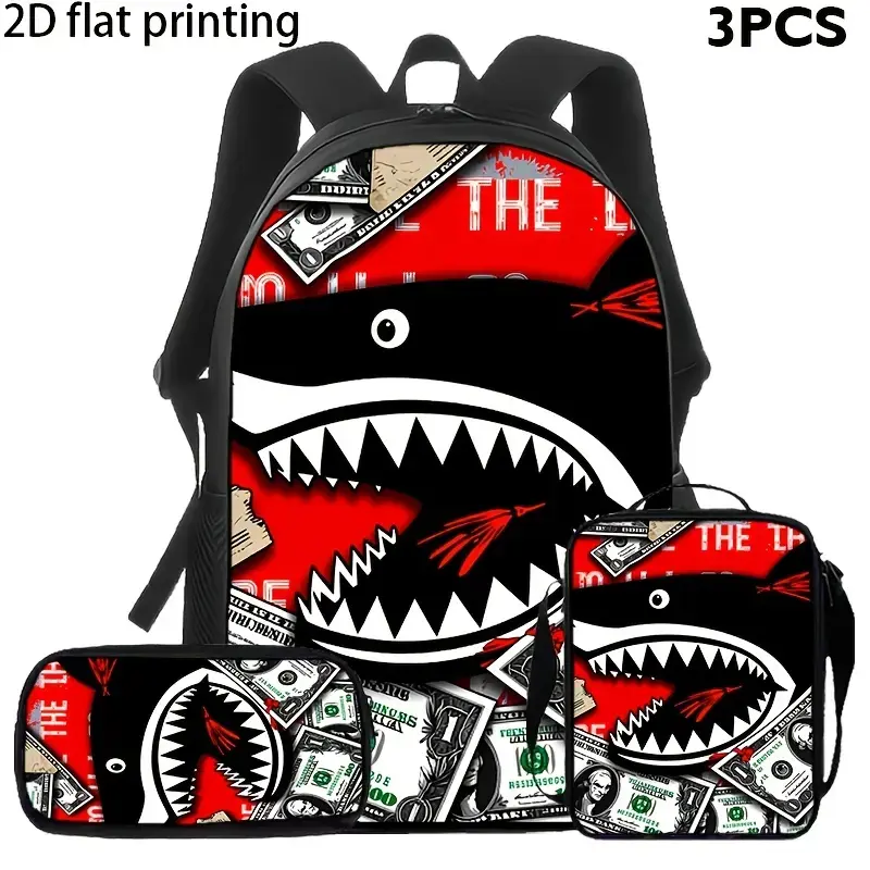 Red shark-mouth 3-piece backpack set featuring a street-art style "money collage" pattern; includes a matching lunch bag and pencil case. A graffiti-style backpack set for kids and teens—an essential for back-to-school.